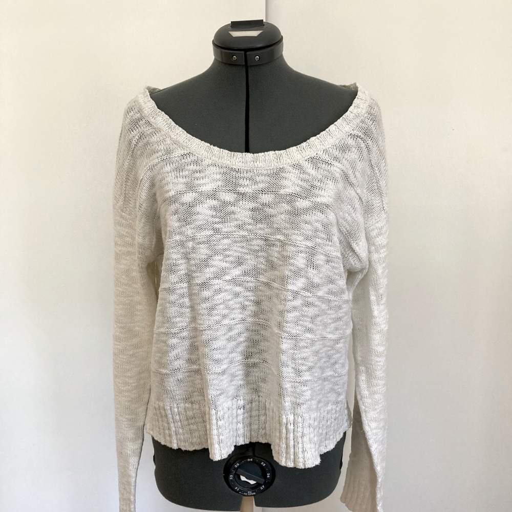 Loose, light boatneck sweater.